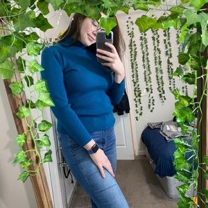 Bright blue turtleneck